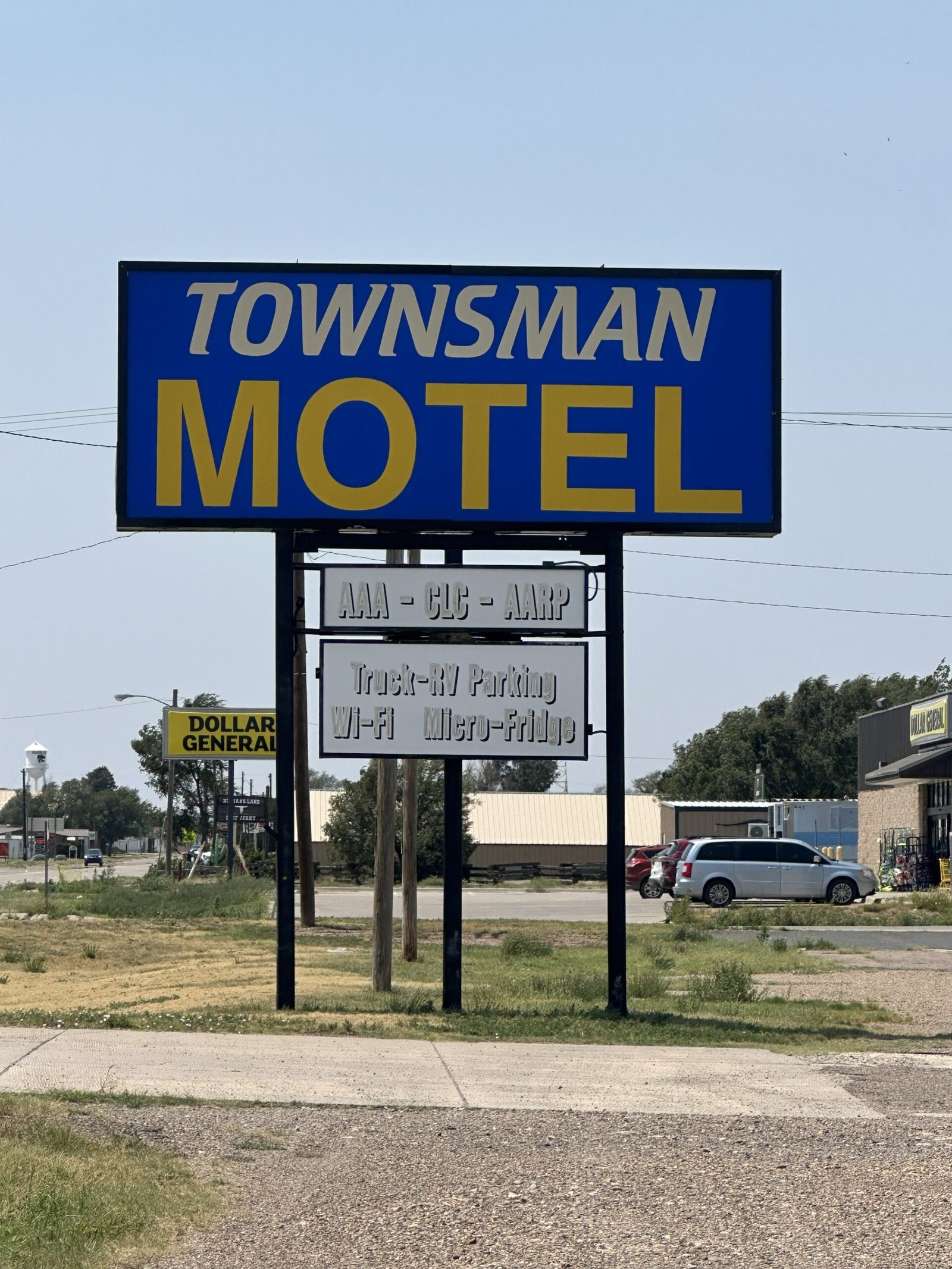 https://townsman.karnisoultion.com/wp-content/uploads/2026/08/Motel-Sign-scaled.jpeg